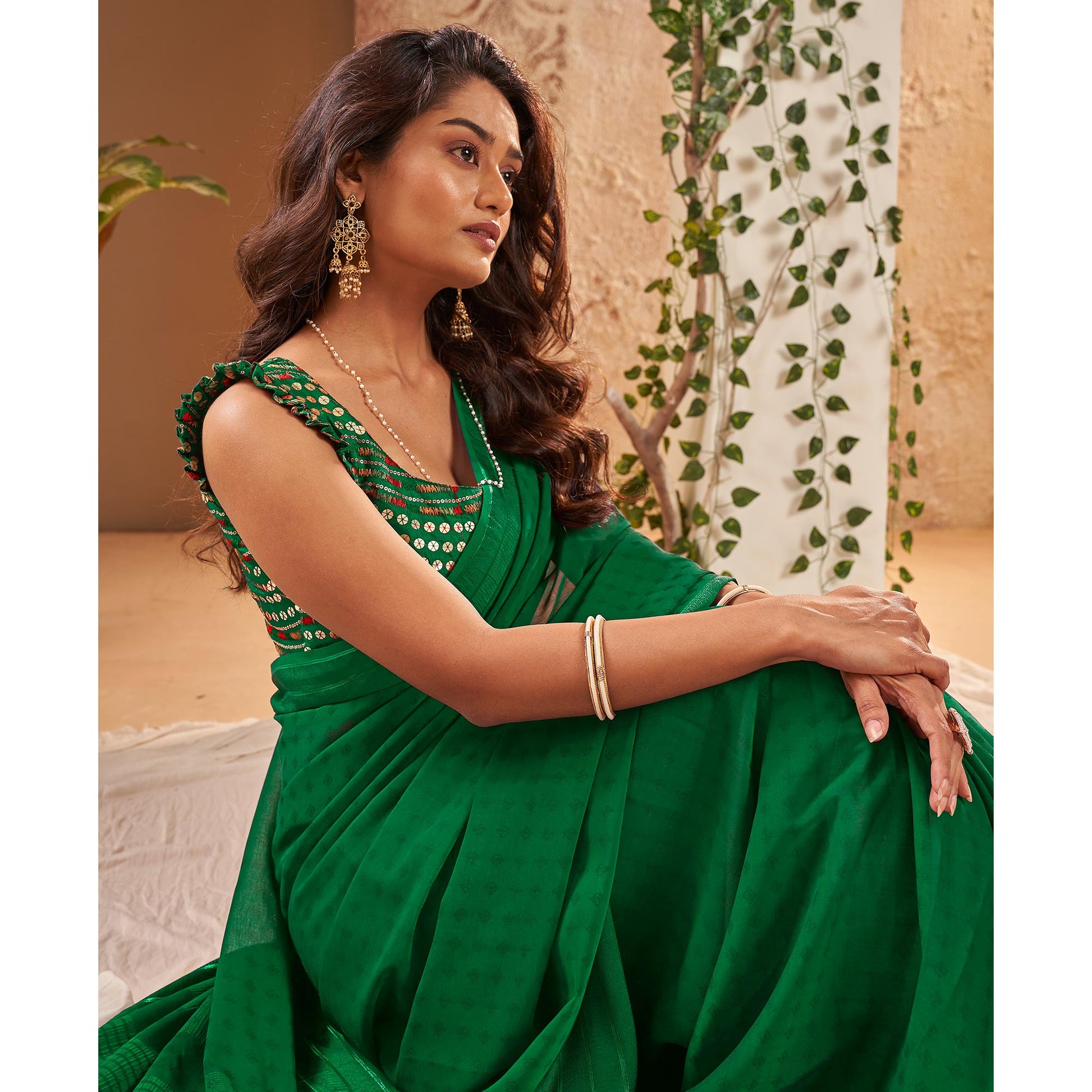 green-woven-georgette-saree-with-tassels-3