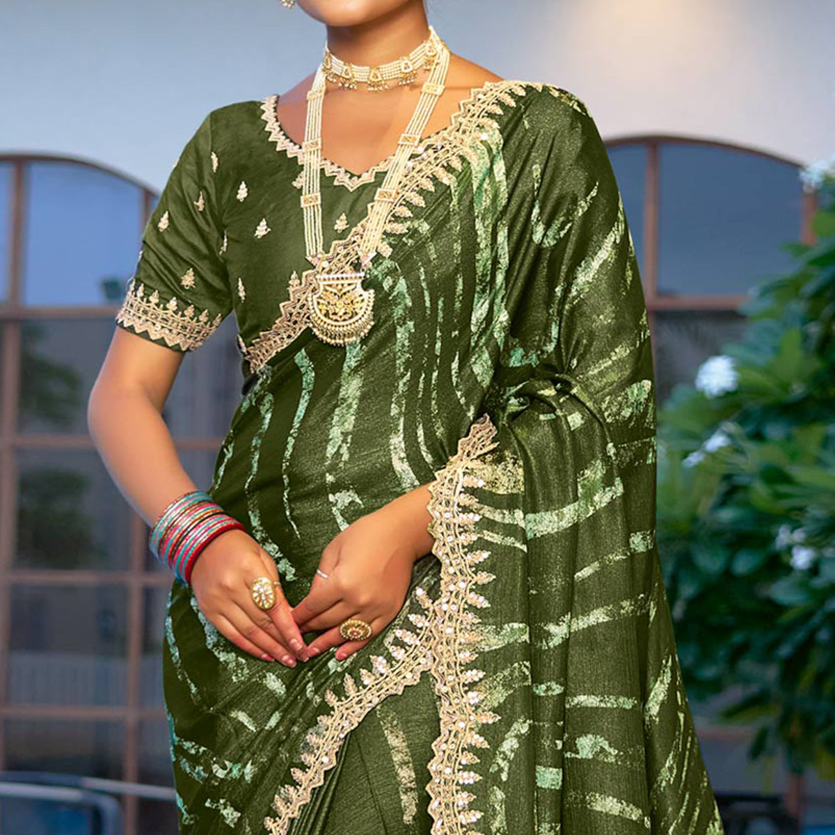 Mehandi Green Printed Chiffon Saree With Sequins Border