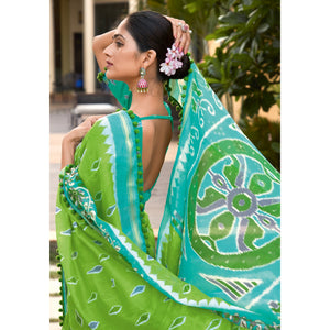 green-printed-pure-cotton-saree-with-pum-pum-border