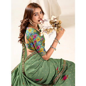 Dusty Green Printed With Woven Georgette Saree With Tassels