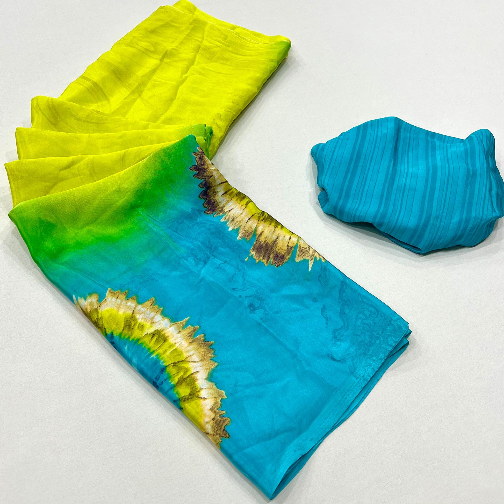 green-turquoise-printed-crepe-silk-saree