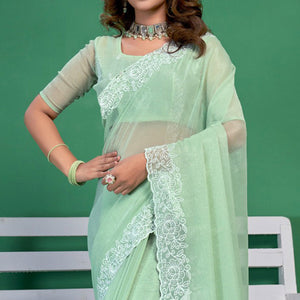 green-chiffon-saree-with-embroidered-border