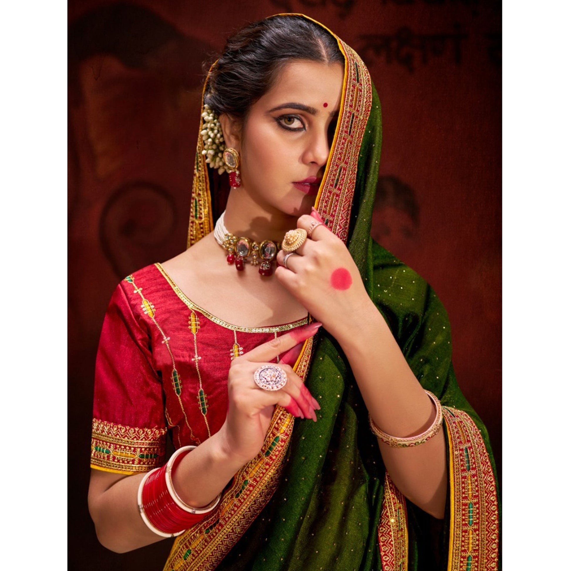green-embroidered-vichitra-silk-saree-with-tassels