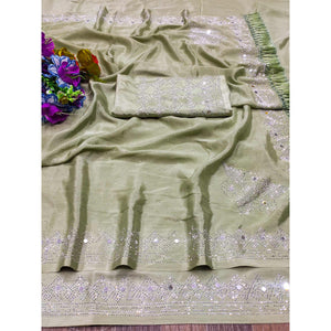 green-mirror-with-swarovski-work-chinon-saree-with-tassels