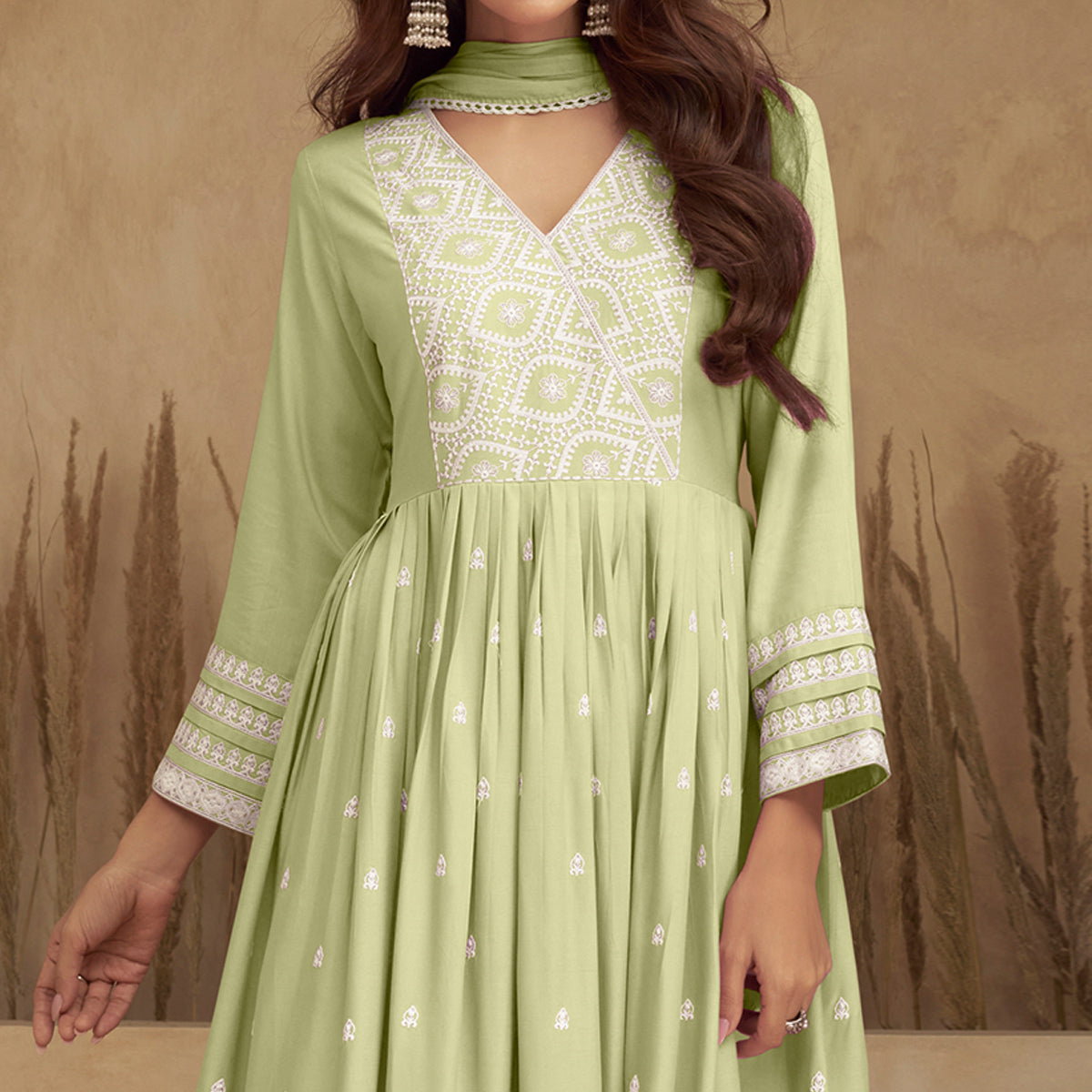 green-lucknowi-embroidered-rayon-naira-cut-suit