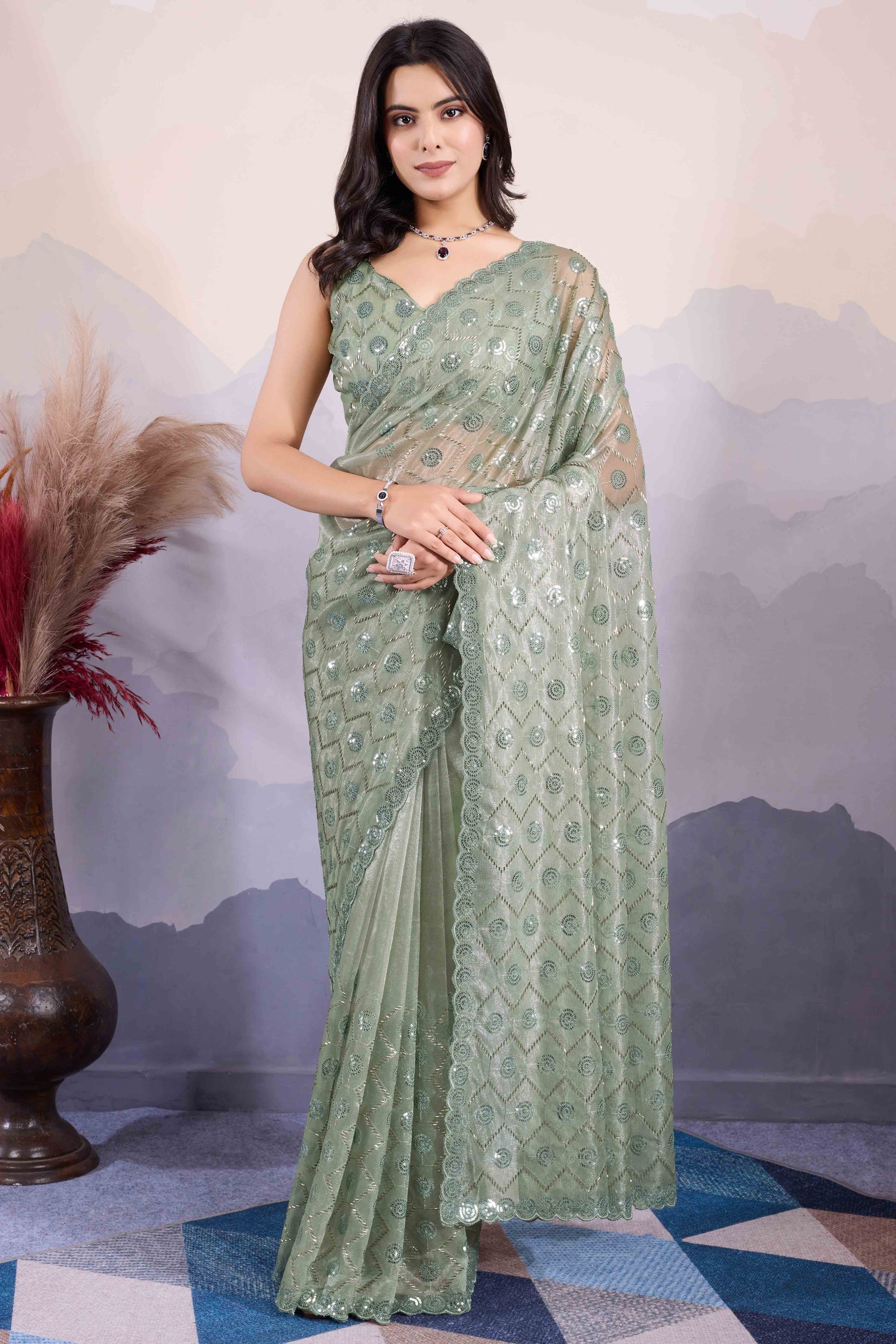 green-sequins-embroidered-twill-net-saree