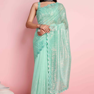 Foam Sea Green Sequins Embroidered Silver Twill Net Saree