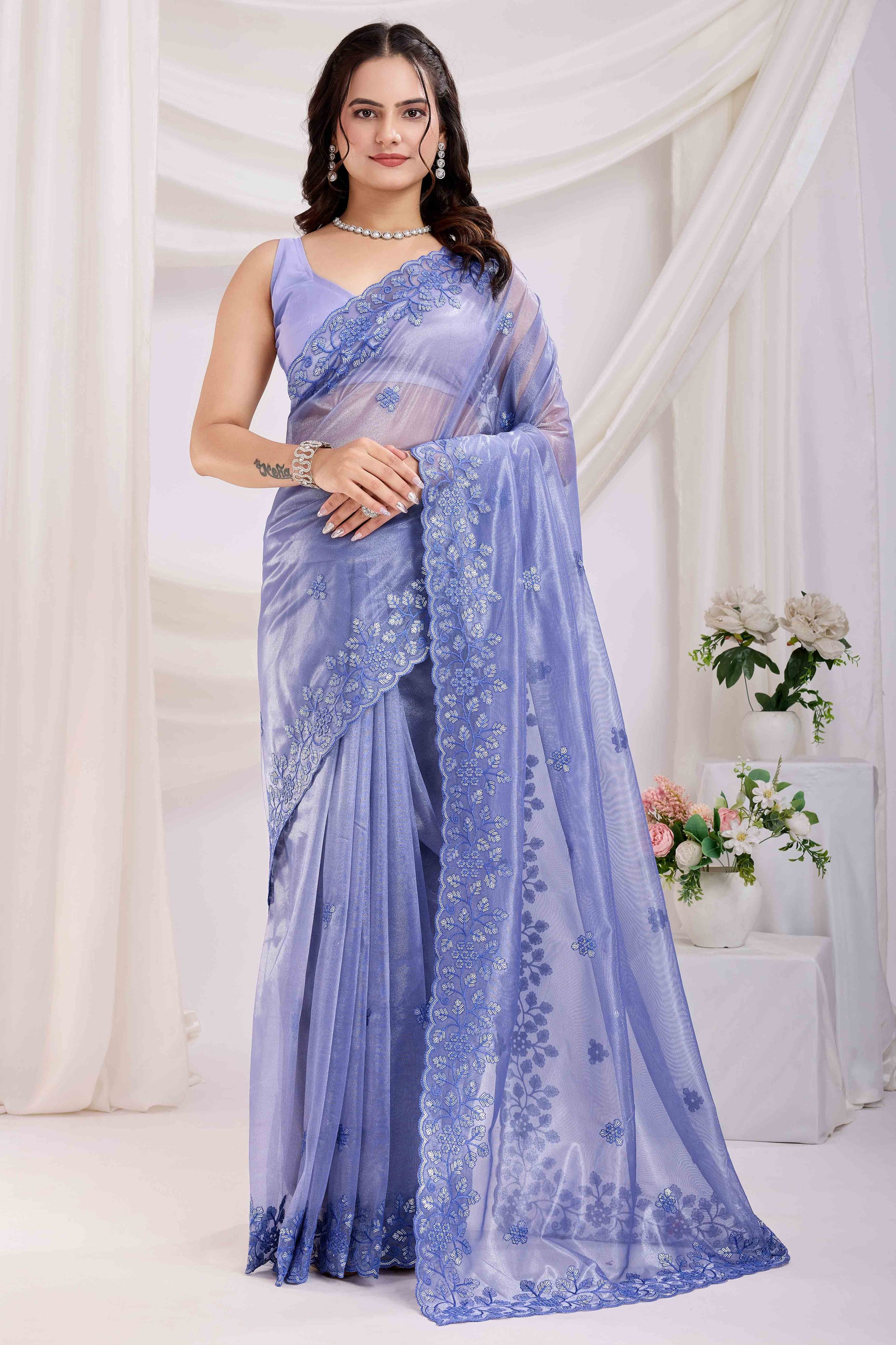 Lavender Floral Sequins Embroidered Twill Net Saree
