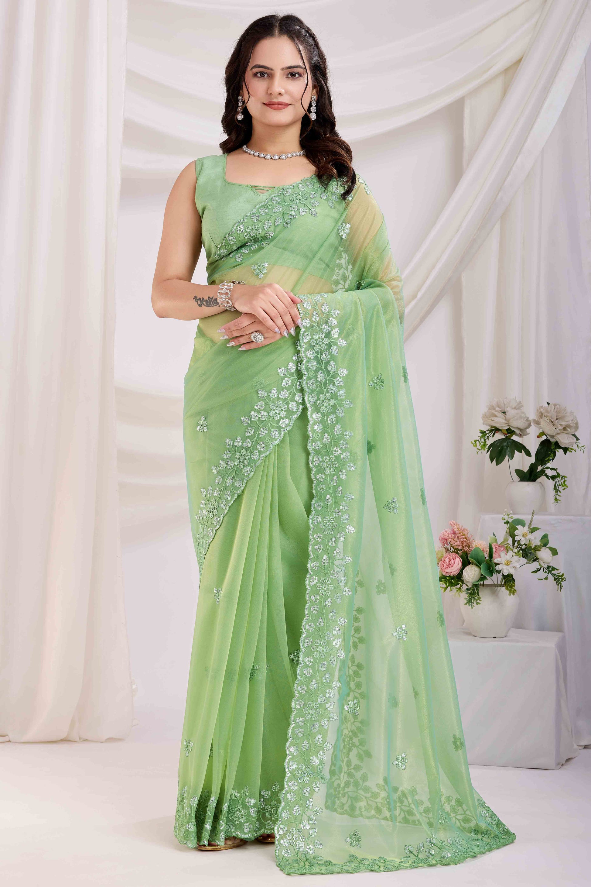 green-floral-sequins-embroidered-twill-net-saree-8