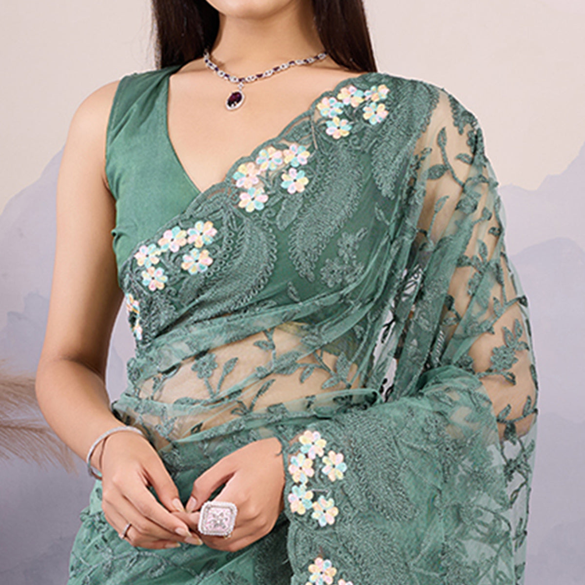green-floral-thread-embroidered-net-saree