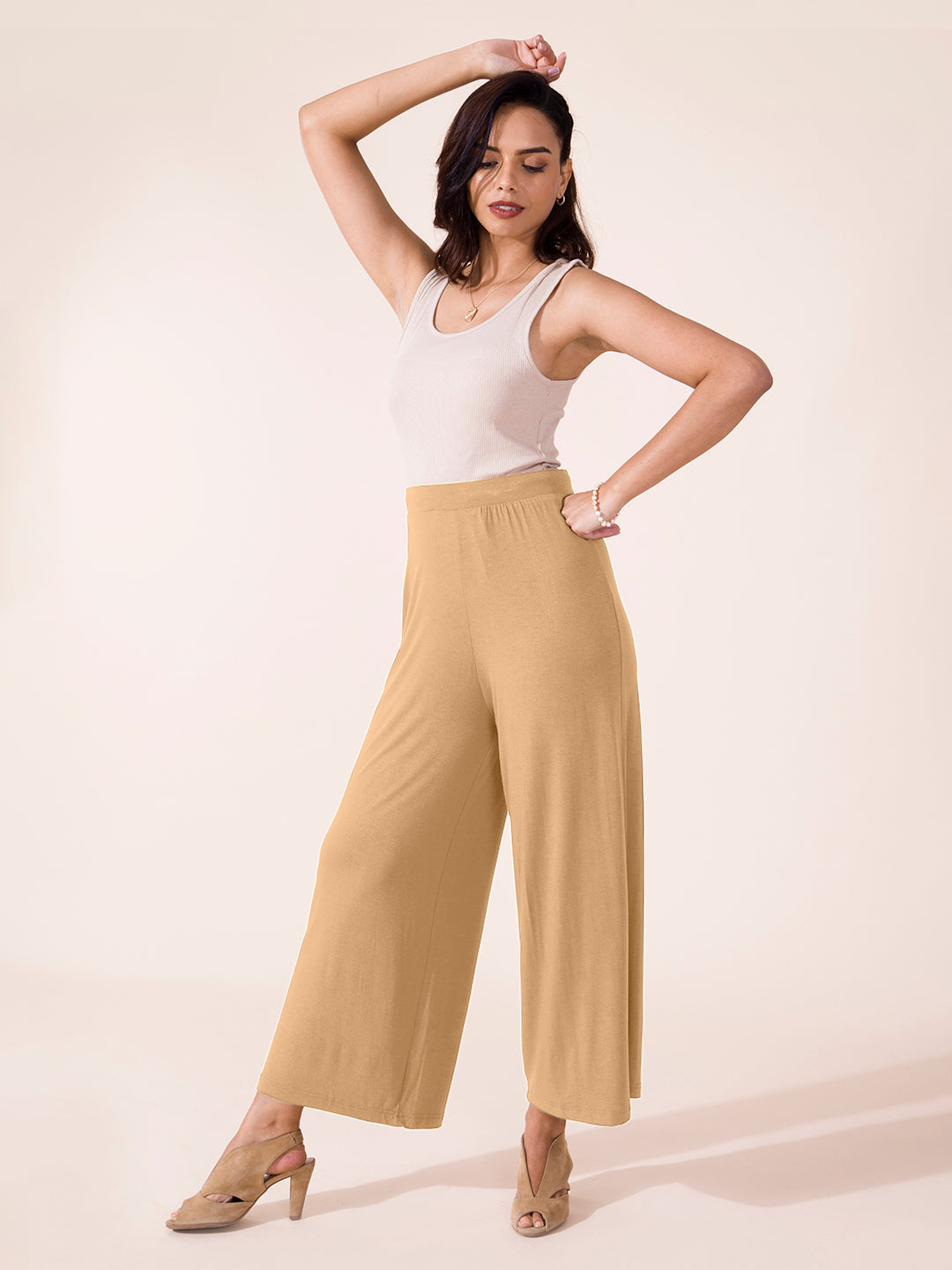 Women Solid Wheat Viscose Mid Rise Knit Palazzos