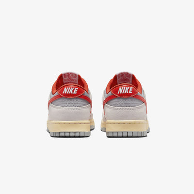 Nike | DUNK LOW { SAIL/PICANTE RED-PHOTON DUST