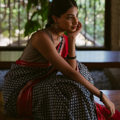 Indo Chanderi Cotton Saree with Screen-printed Floral Motifs in a striking red border