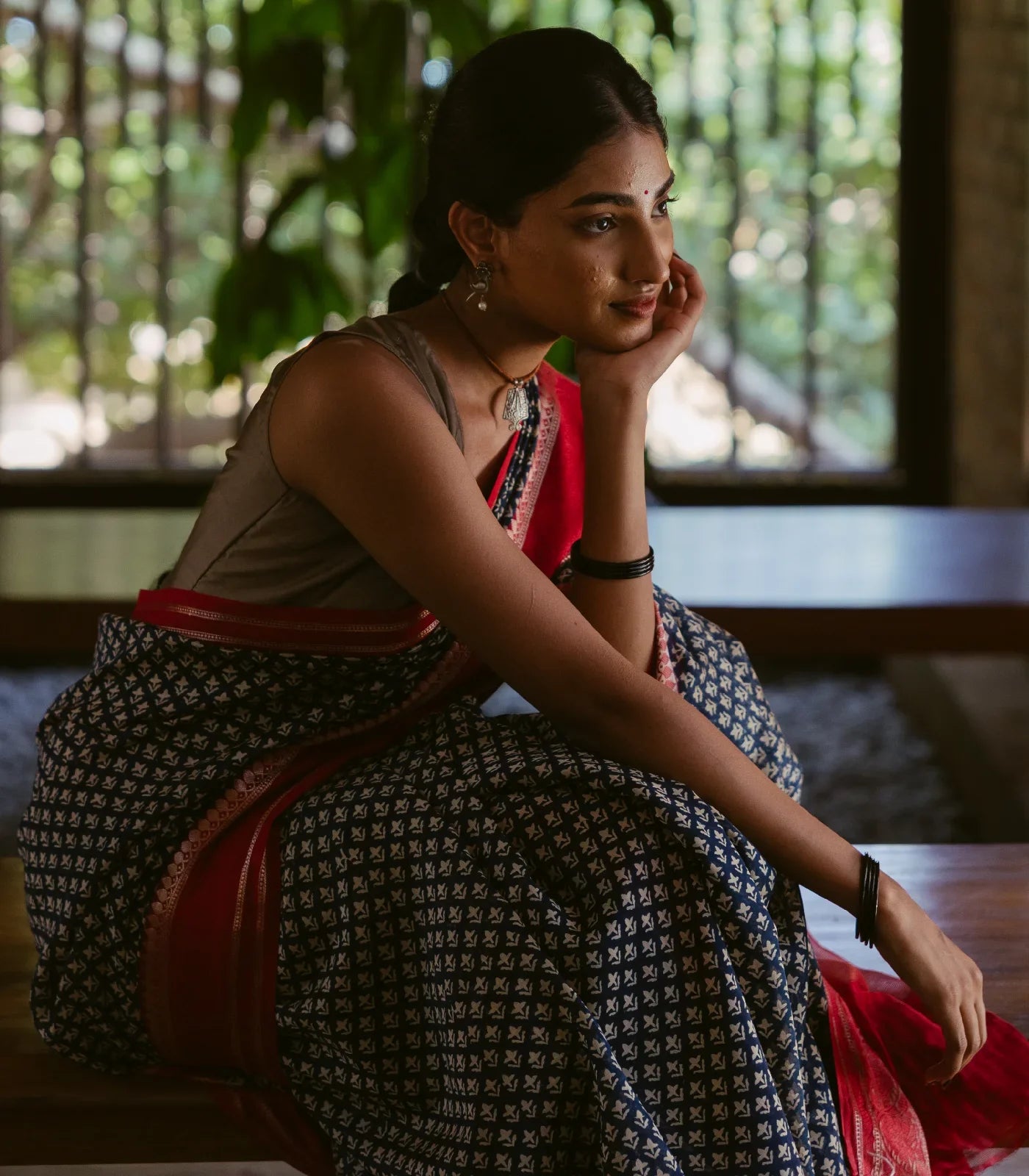 Indo Chanderi Cotton Saree with Screen-printed Floral Motifs in a striking red border