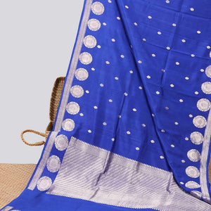 Blue floral buttas raw mango silk saree with self round buttas border & striped zari design pallu