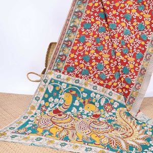 Red floral vine machine-printed kalamkari cotton saree, contrast tree motifs border & peacock pallu