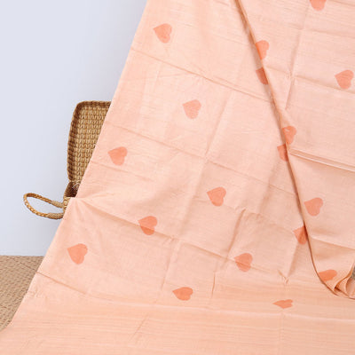 Borderless Orange all over heart motifs tussar saree