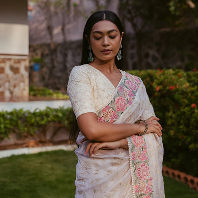 Cream Woven Organza Silk Saree With Embroidered Floral Motifs