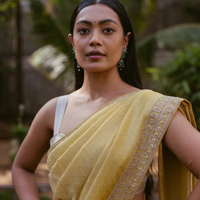 Mustard Woven Tissue Emboss Embroidery Saree