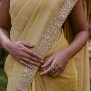 Mustard Woven Tissue Emboss Embroidery Saree