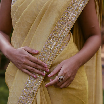 Mustard Woven Tissue Emboss Embroidery Saree