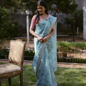 Turquoise Woven Organza Printed Saree With Embroidered Border