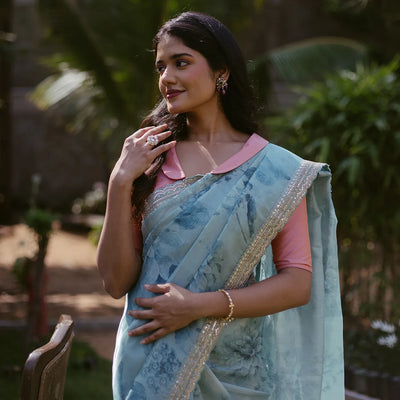 Turquoise Woven Organza Printed Saree With Embroidered Border