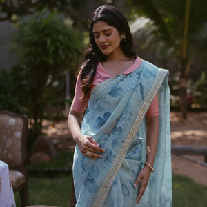 Turquoise Woven Organza Printed Saree With Embroidered Border