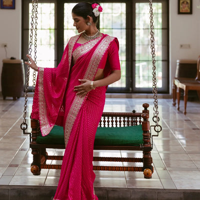 Pink Woven Georgette Saree With Floral Embroidery