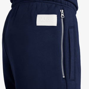 NIKE | PARIS SAINT-GERMAIN STANDARD ISSUE DRI-FIT SOCCER TAPERED PANT { MIDNIGHT NAVY/UNIVERSITY RED