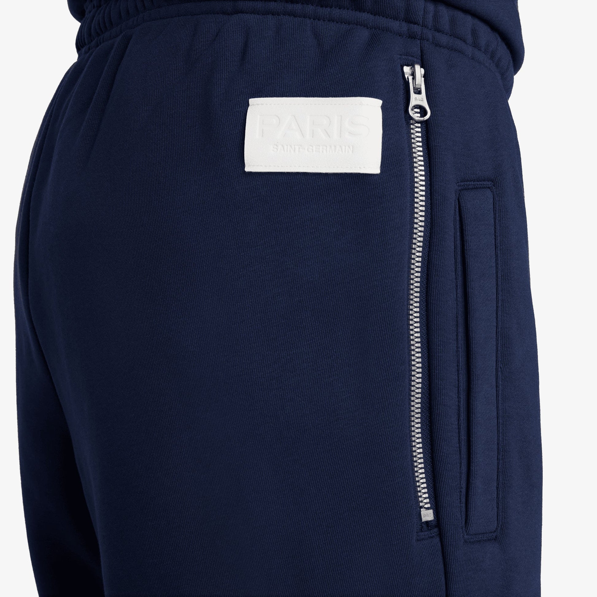 NIKE | PARIS SAINT-GERMAIN STANDARD ISSUE DRI-FIT SOCCER TAPERED PANT { MIDNIGHT NAVY/UNIVERSITY RED