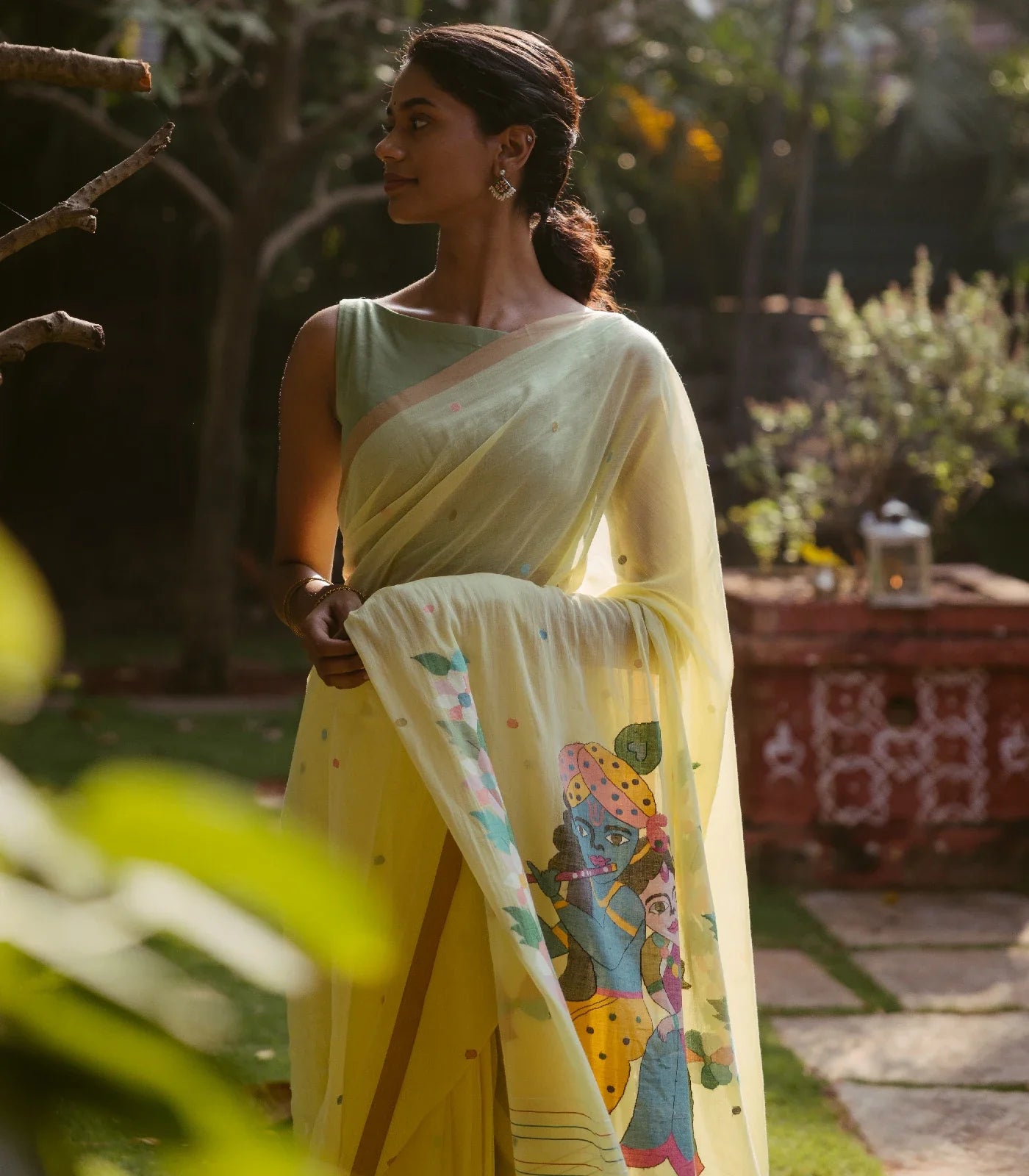 Yellow Handloom Bengal Cotton Saree With Radha Krishna In a Floral Swing Pallu design