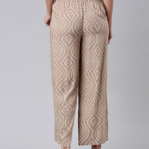 Women Beige Woven Viscose Mid Rise Printed Palazzo