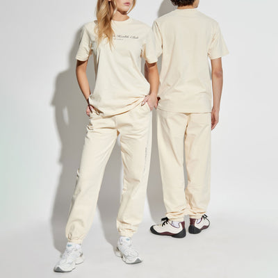 SPORTY & RICH | NY HEALTH CLUB T-SHIRT { CREAM