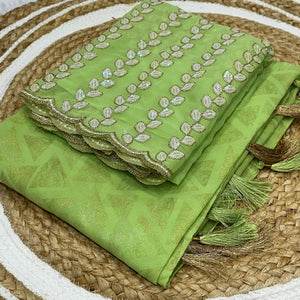green-geometric-foil-printed-georgette-saree-with-tassels
