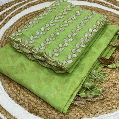 green-geometric-foil-printed-georgette-saree-with-tassels