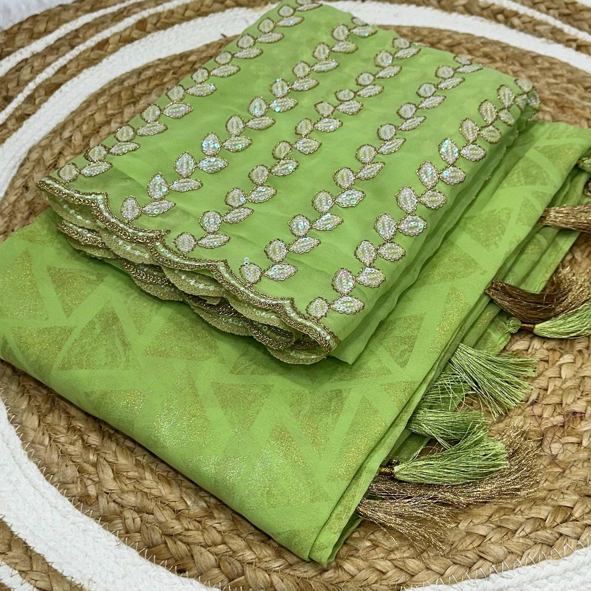 green-geometric-foil-printed-georgette-saree-with-tassels