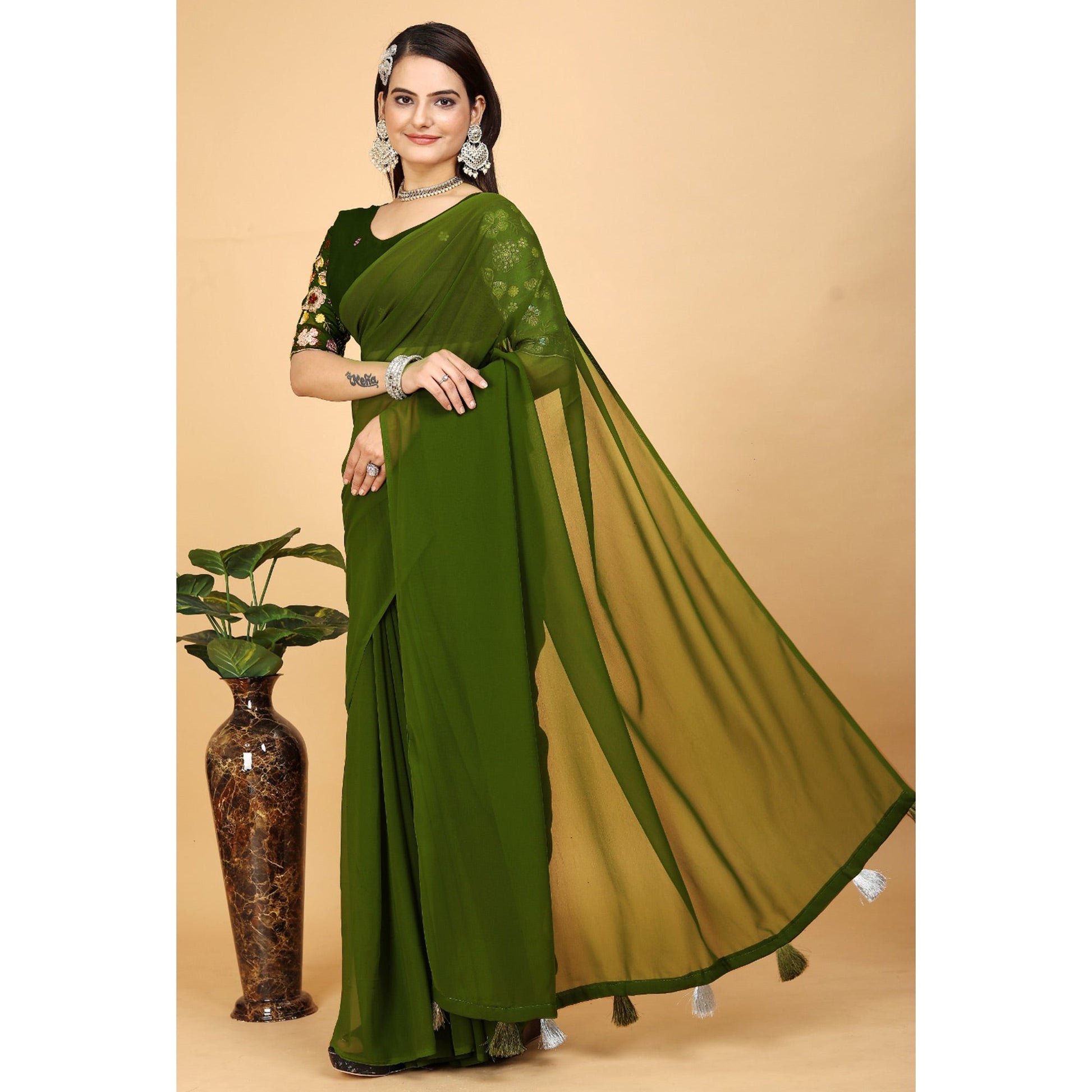 green-solid-georgette-saree-with-with-tassels
