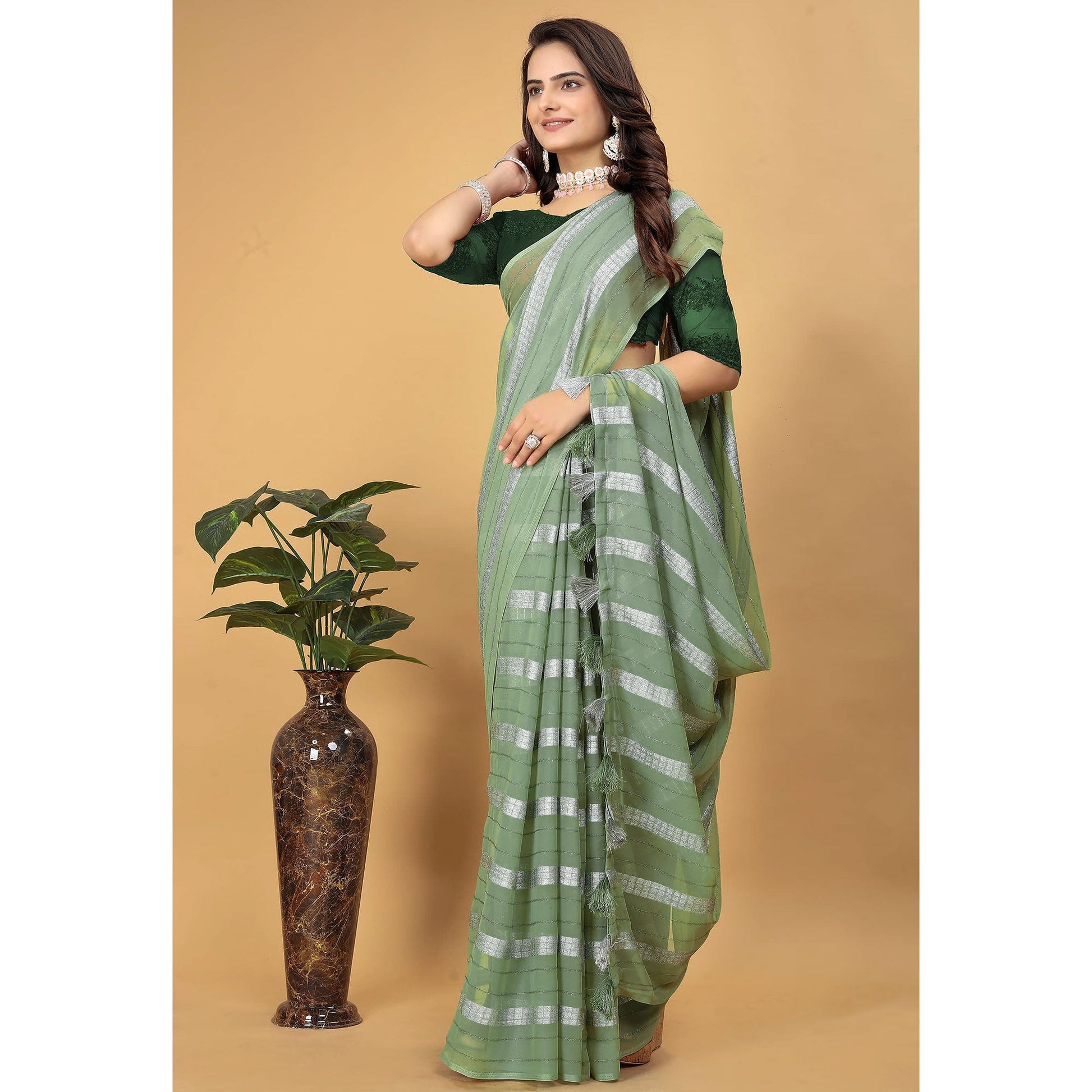 green-zari-striped-georgette-saree-with-tassels