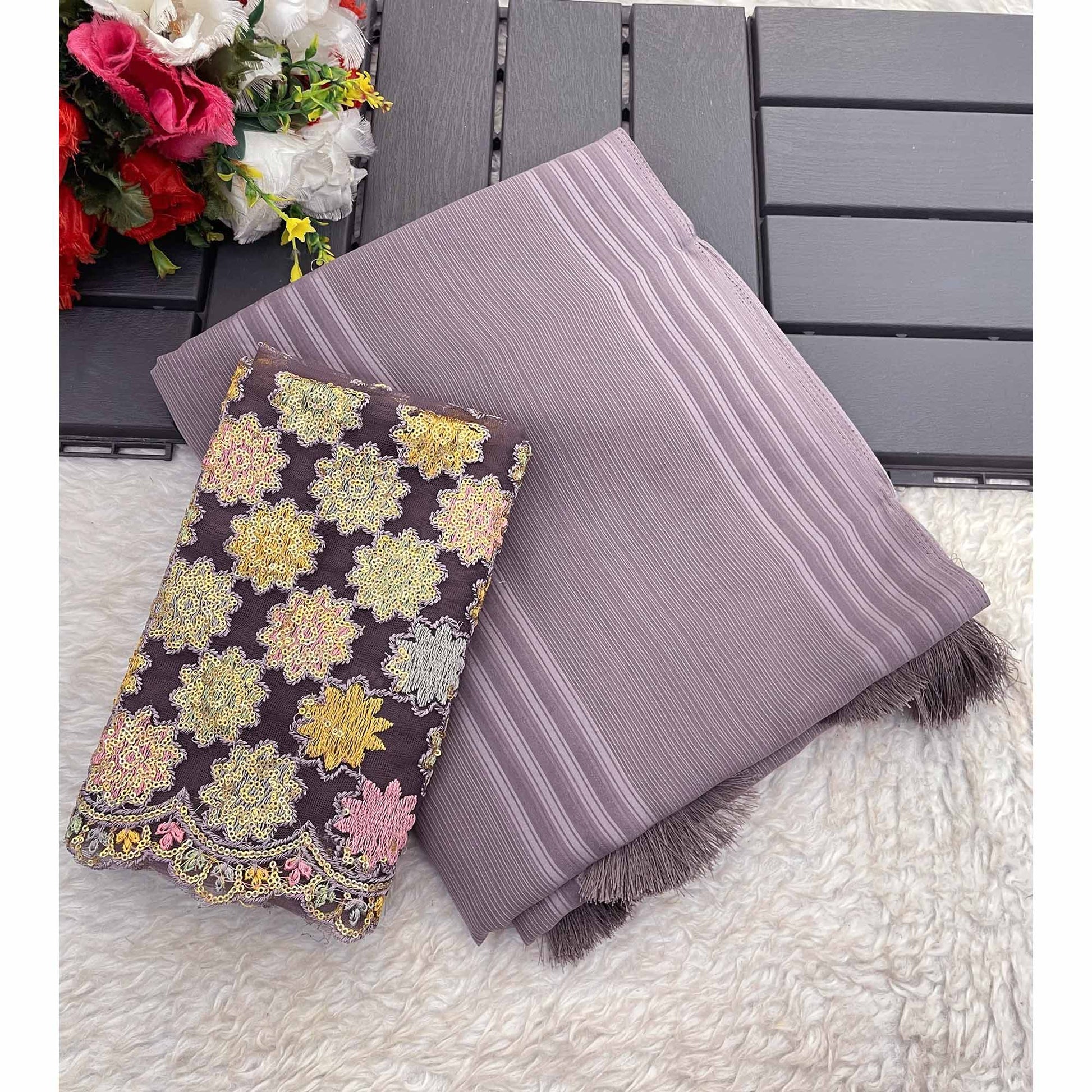 Mauve Zari Striped Woven Georgette Saree