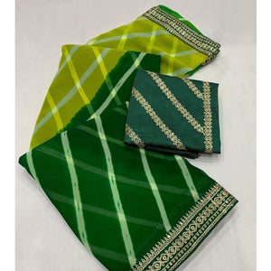 green-printed-georgette-saree-with-lace-border
