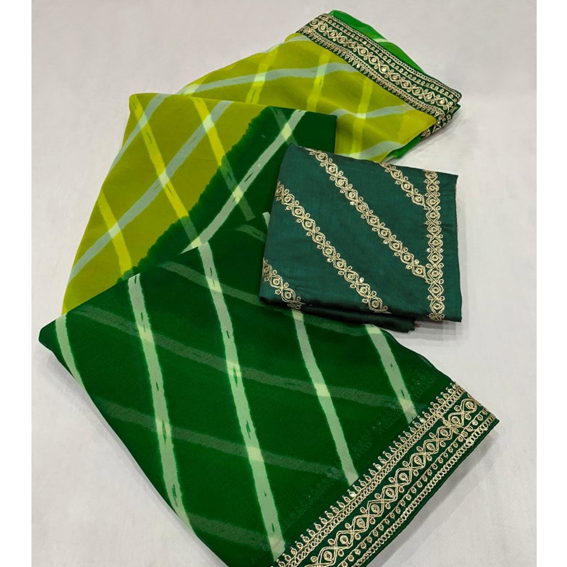 green-printed-georgette-saree-with-lace-border