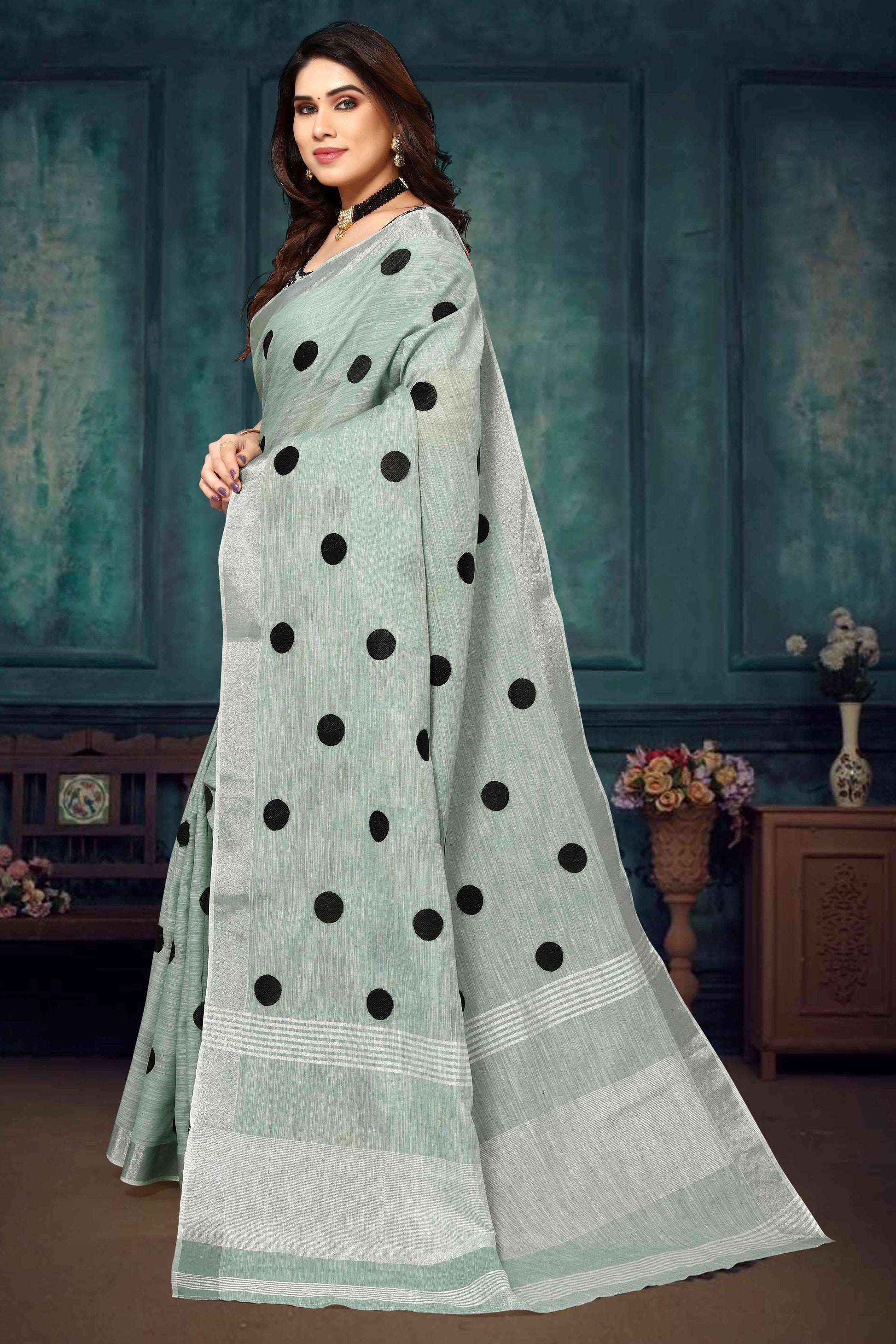 green-embroidered-linen-cotton-saree-with-zari-border