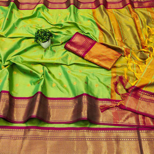 green-zari-woven-lichi-art-silk-saree-with-tassels