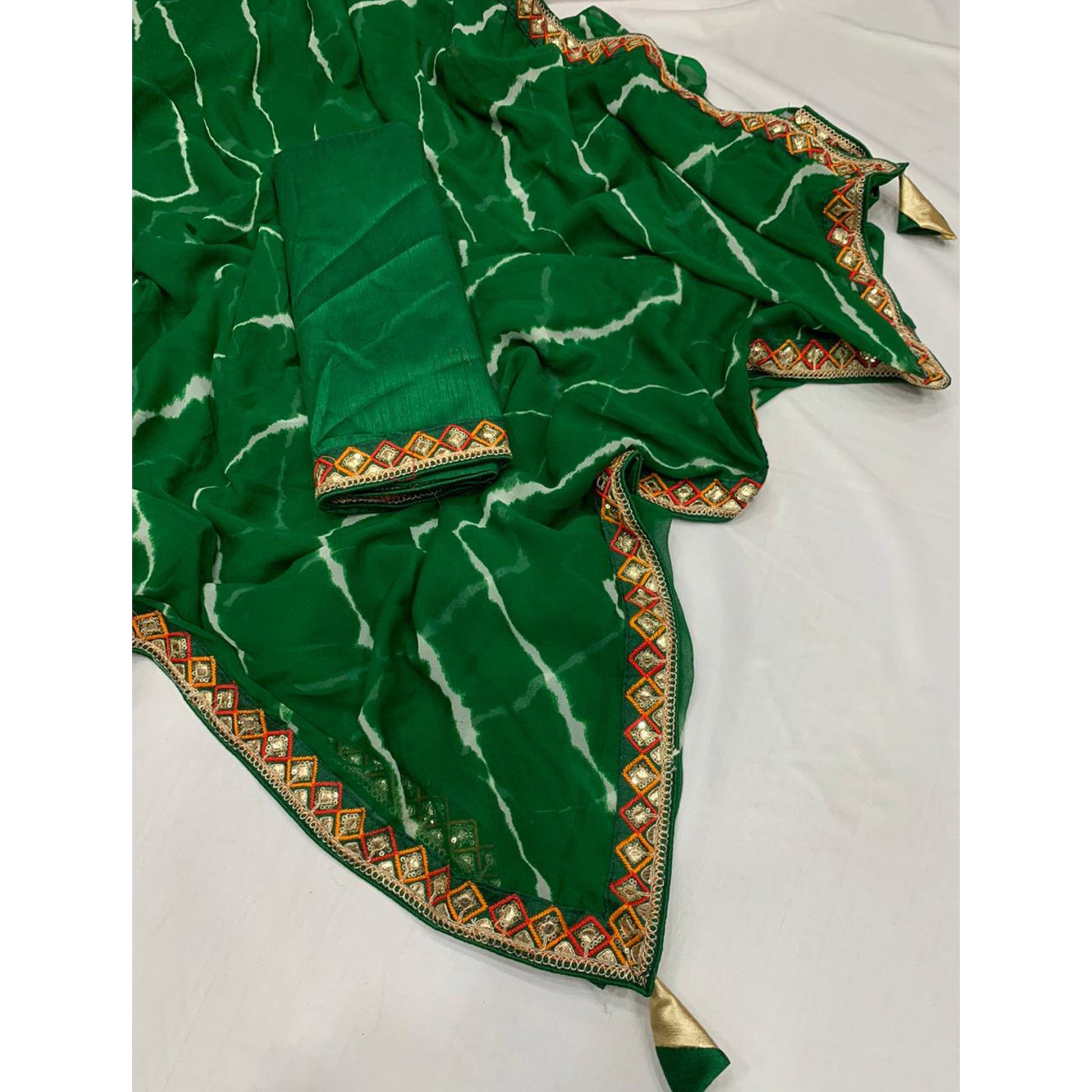 green-printed-georgette-saree-with-sequins-border