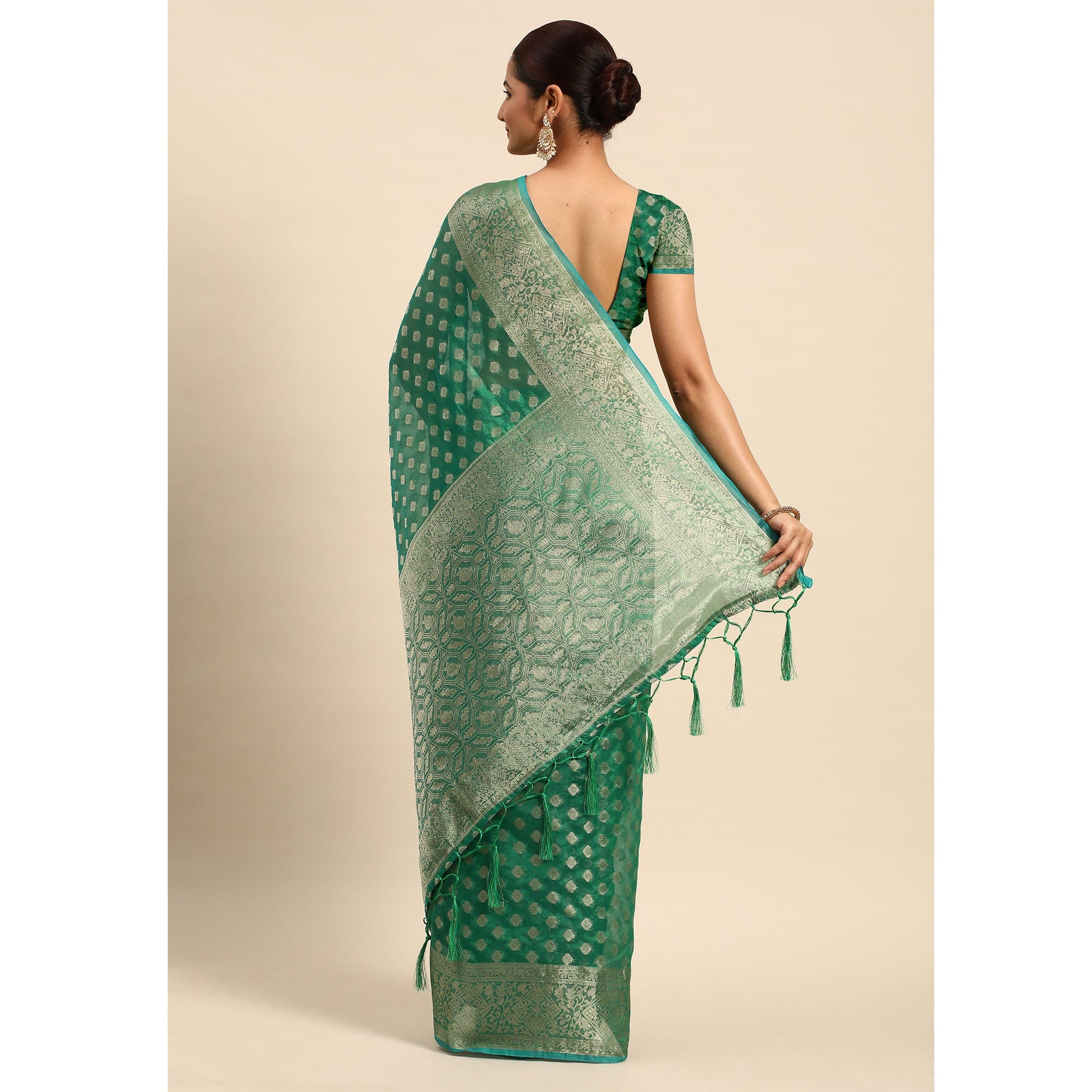green-woven-organza-silk-saree-with-tassels