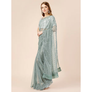 green-tikki-wor-lycra-saree-with-embroidered-border