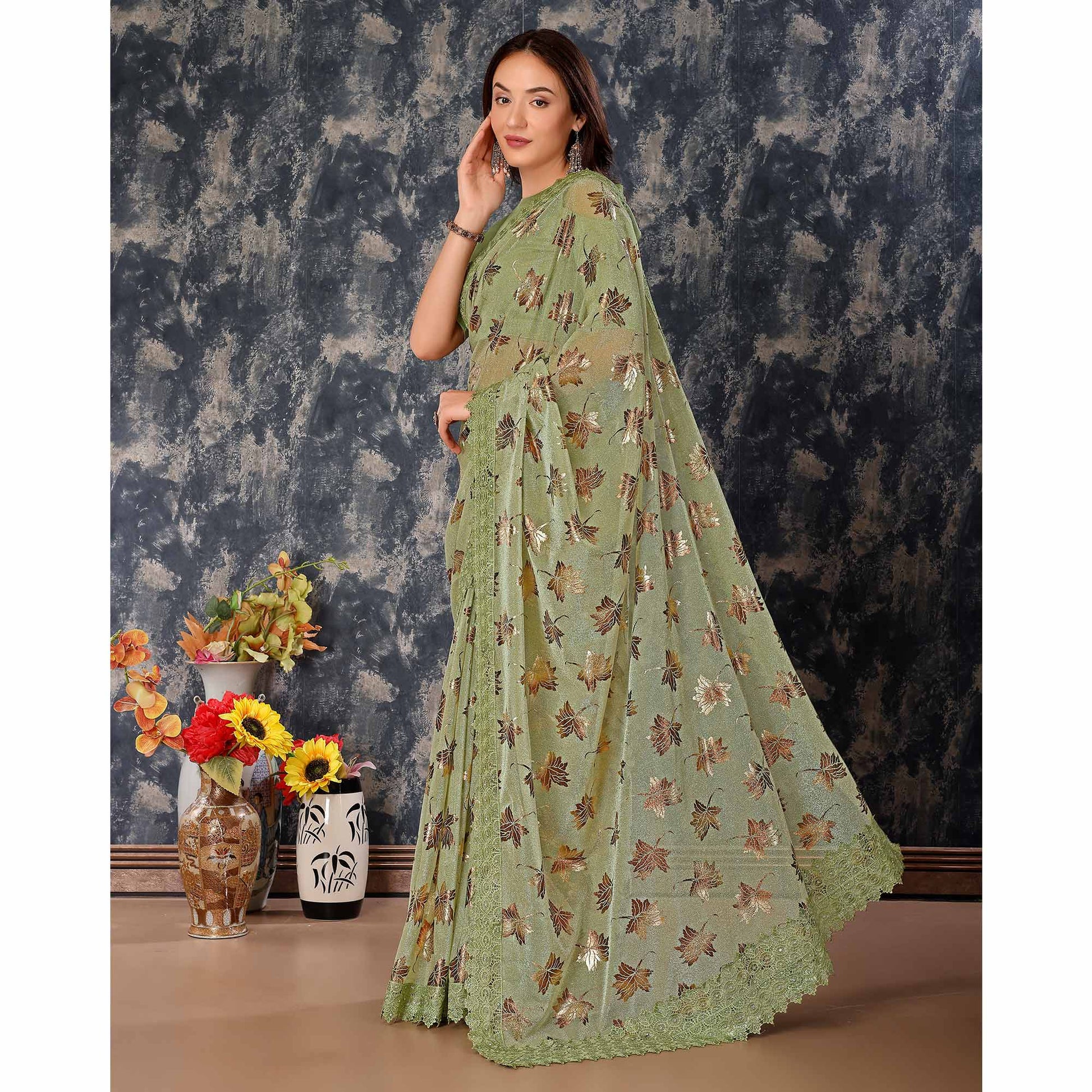 green-foil-printed-lycra-saree-with-embroidered-lace-border