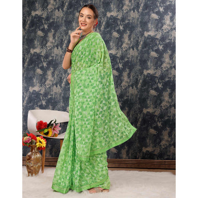 green-geometric-printed-chiffon-saree-with-lace-border