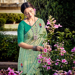 green-printed-raw-silk-saree-with-fancy-border